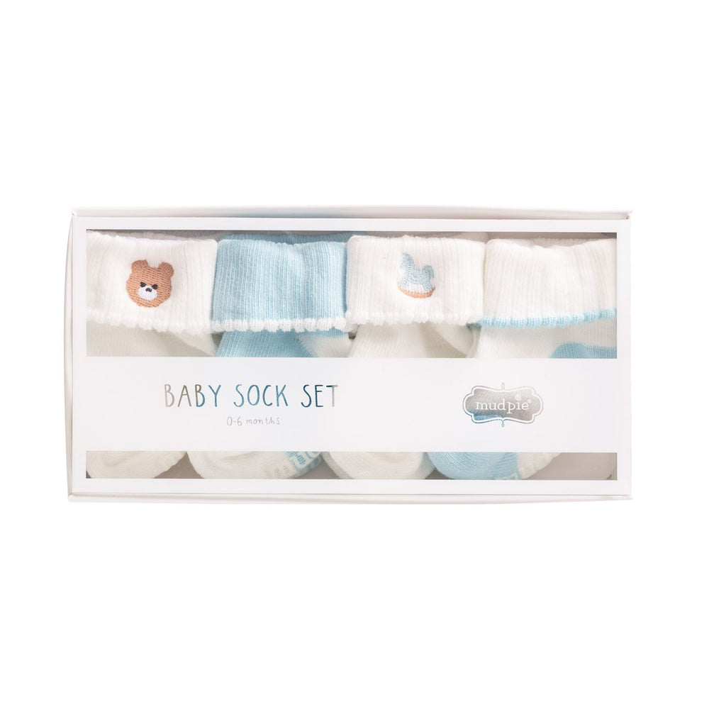 CHILDRENS FOLD OVER SOCKS IN WHITE AND BLUE PATTERNS ON WHITE BACKGROUND IN BABY SOCK SET PACKAGING