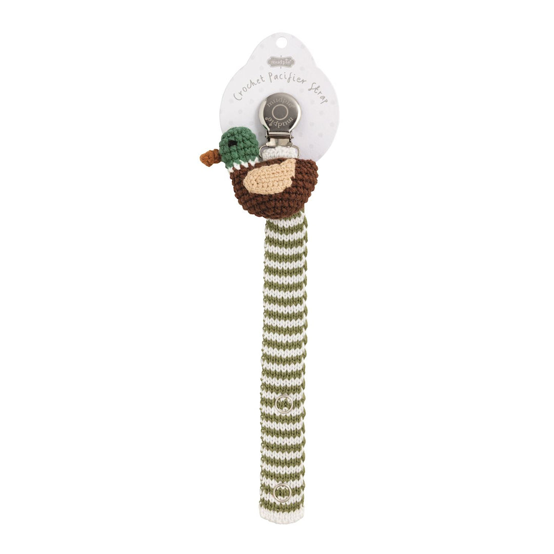 Baby rattle with striped handle and owl design on a white background