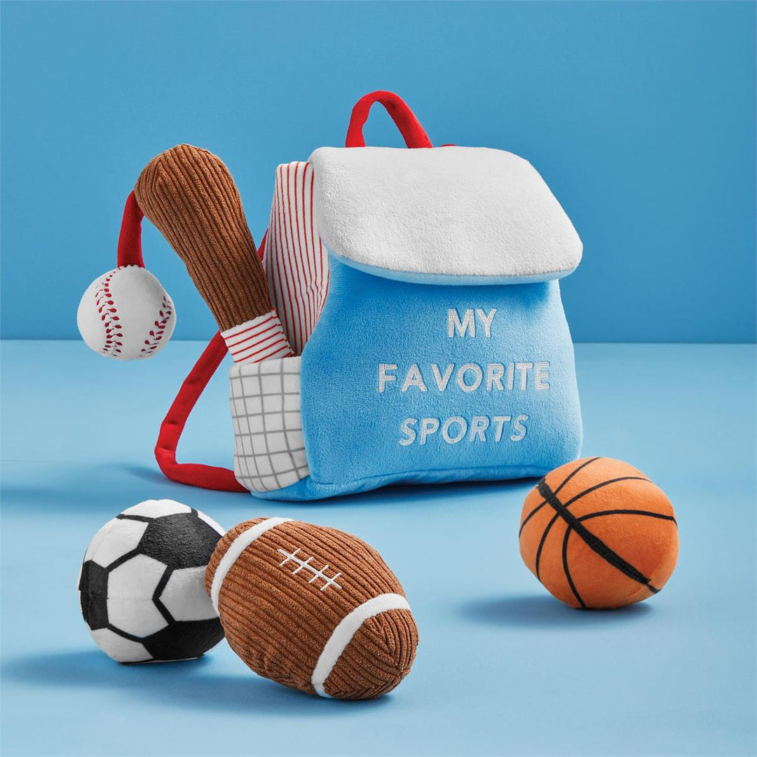Plush sports bag with sports-themed toys on a blue background