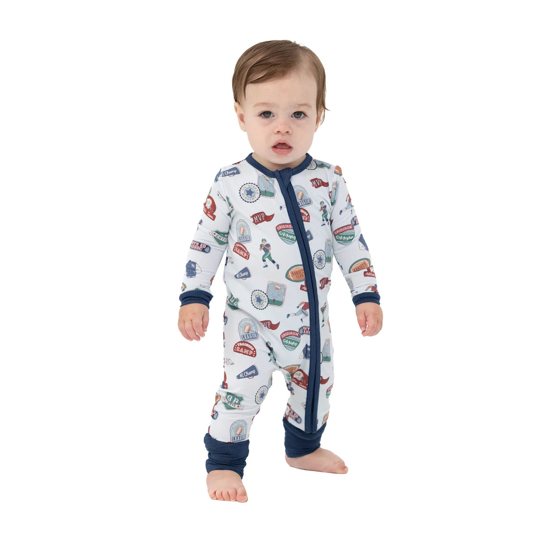 Angel Dear Football Patches Convertible Romper worn by a baby in a lifestyle view highlighting the football patches design