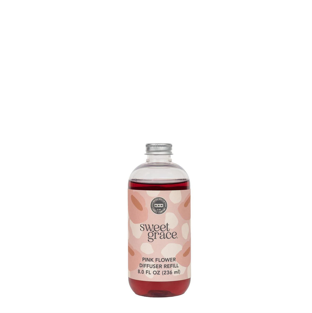 Sweet Grace Pink Dye Flower Refill oil bottle for a color-changing flower diffuser