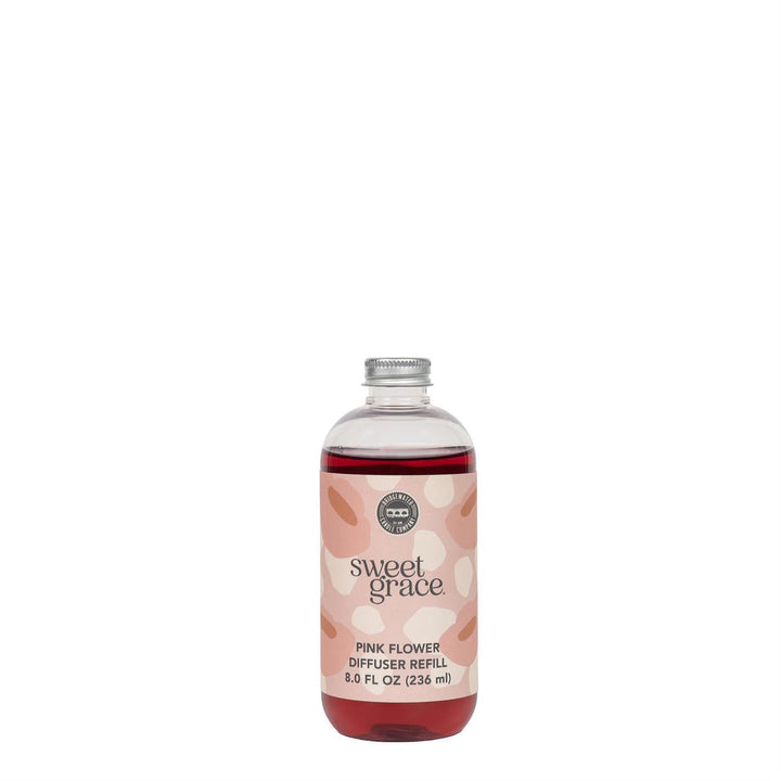 Sweet Grace Pink Dye Flower Refill oil bottle for a color-changing flower diffuser