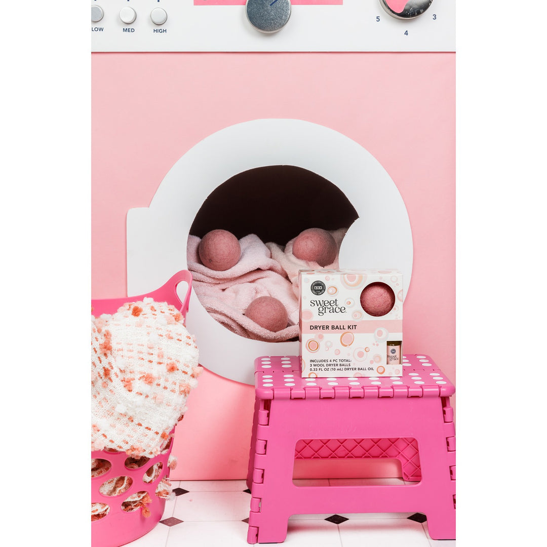 Sweet Grace Dryer Ball Kit with three reusable wool dryer balls and fragrance oil