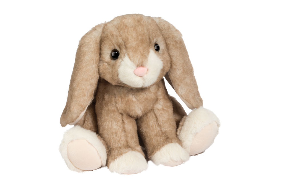 BEIGE STUFFED BUNNY ON WHITE BACKGROUND