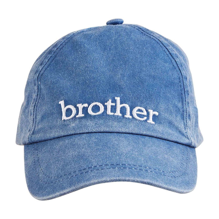 Blue cap with 'brother' embroidered on it against a white background