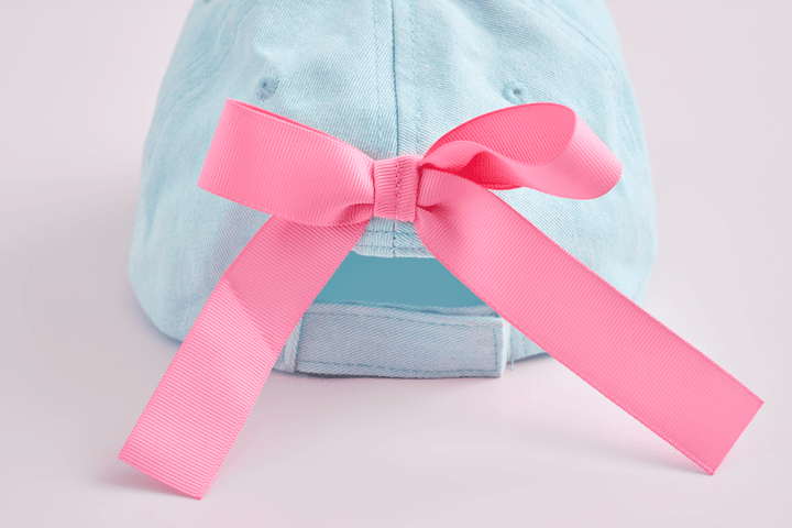 LIGHT BLUE FLOWER EMBROIDERED HAT WITH PINK BOW ON BACK