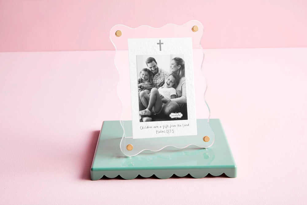 acrylic frame on book on table