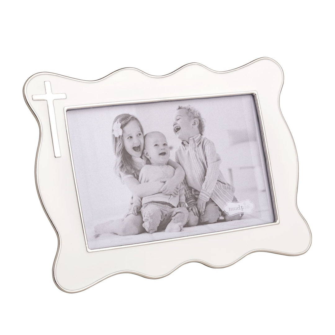 White scalloped picture frame with silver trim and cross detail