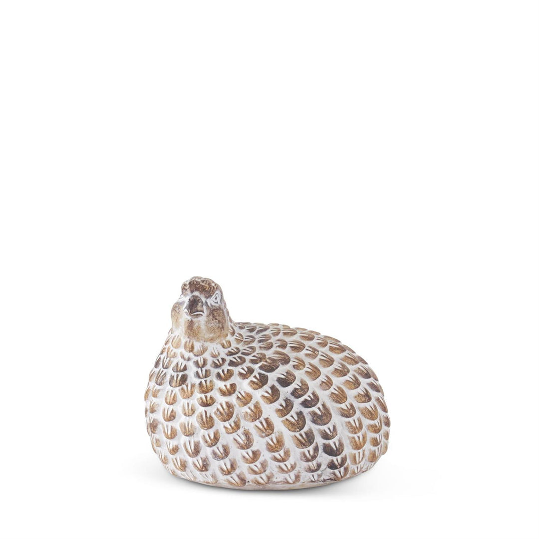 Decorative ceramic bird figurine on a white background