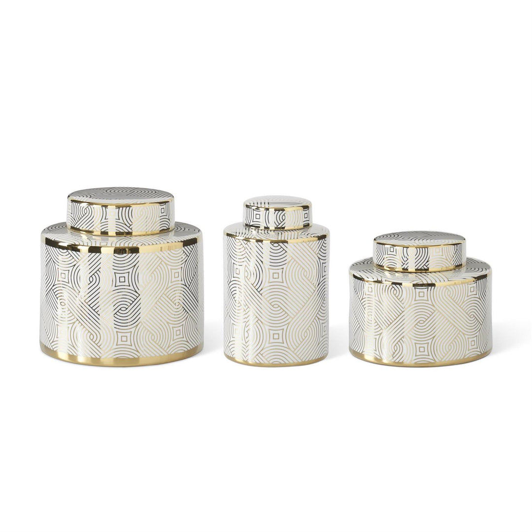 Set of three decorative jars with geometric patterns on a white background