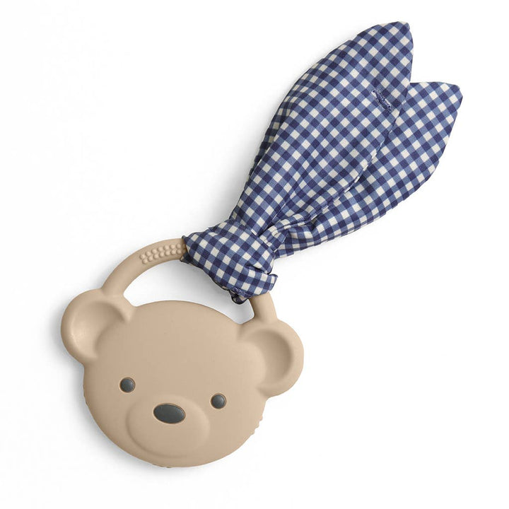 Bear-shaped teether with a blue checkered cover on a white background