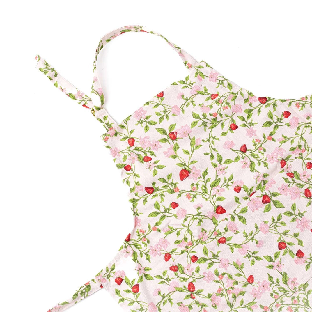 Floral apron with pink flowers and green leaves on a white background