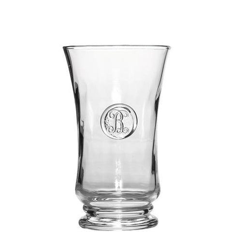 A clear hand blown glass tumbler with a 12.6 oz capacity and a visible monogrammed marking on the side.