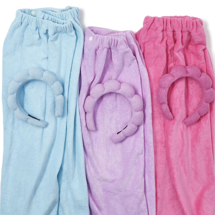 Three pairs of pastel-colored fleece pants with cloud-shaped hems on a white background.