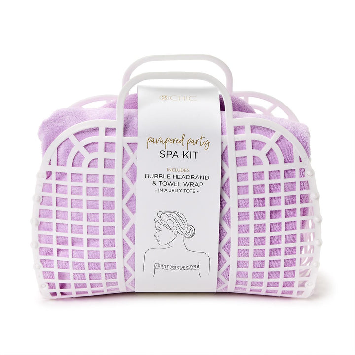 Purple towel with a spa kit labeled 'Pampered Party' on a white background