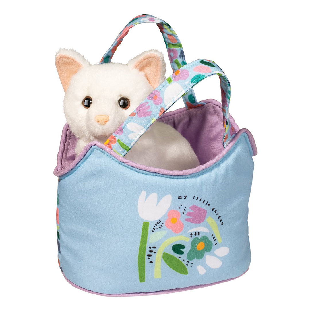 WHITE CAT IN A FLORAL AND BLUE PLAY SACK ON WHITE BACKGROUND