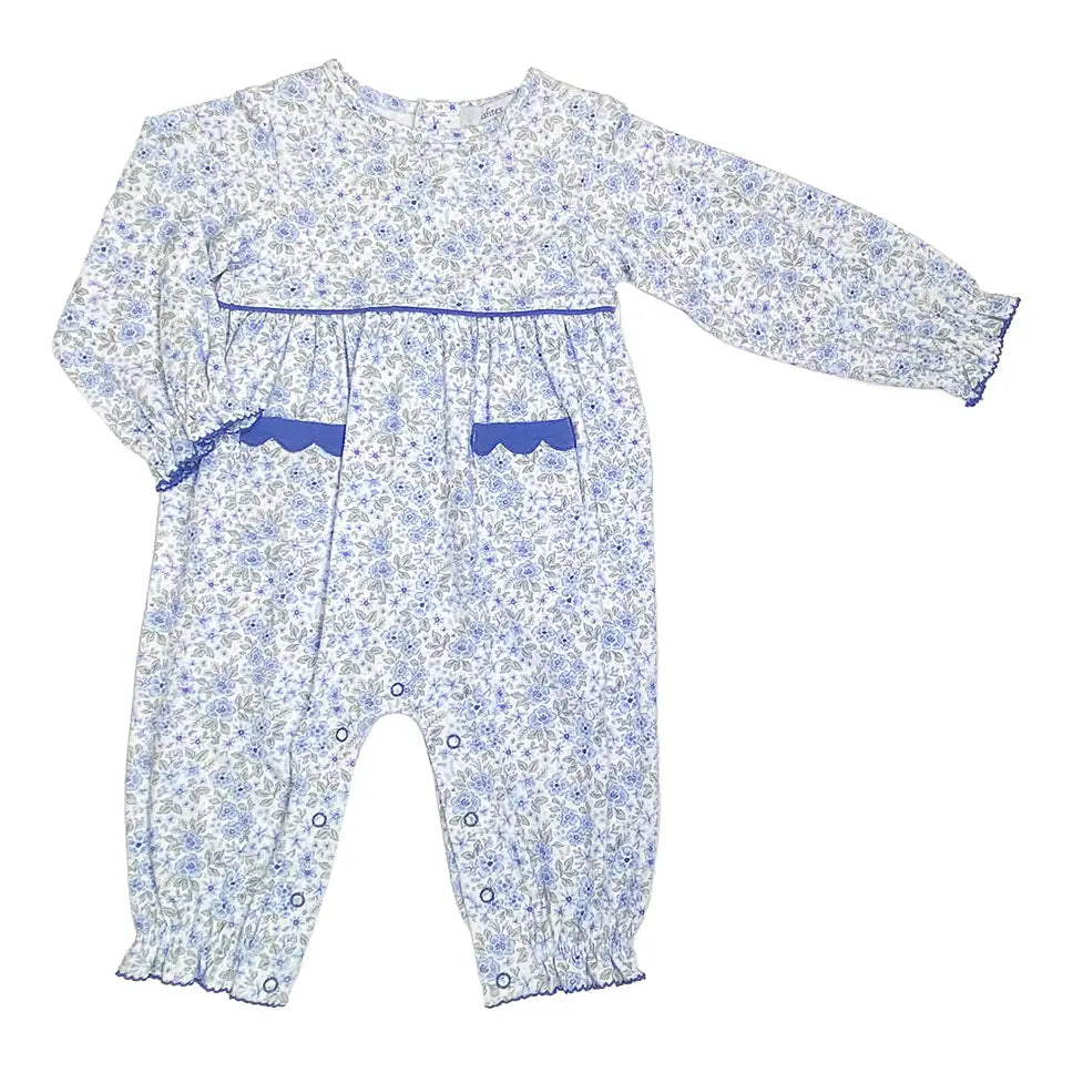 The Ditsy Flower romper wraps baby girls in a soft blue floral print with charming ruffles and pockets for an easy one-piece fall look.