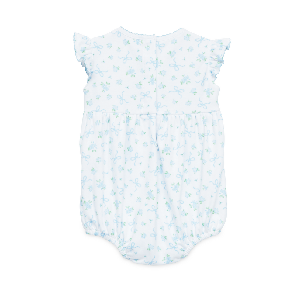 WHITE SMOCKED BUBBLE WITH FLUTTER SLEEVES AND ALL OVER BLUE AND GREEN BOW DESIGN