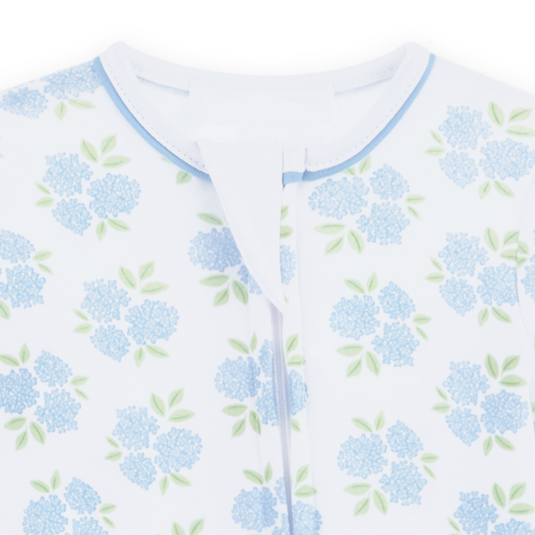 Allover hydrangea floral print in sky blue and soft green footie pajama