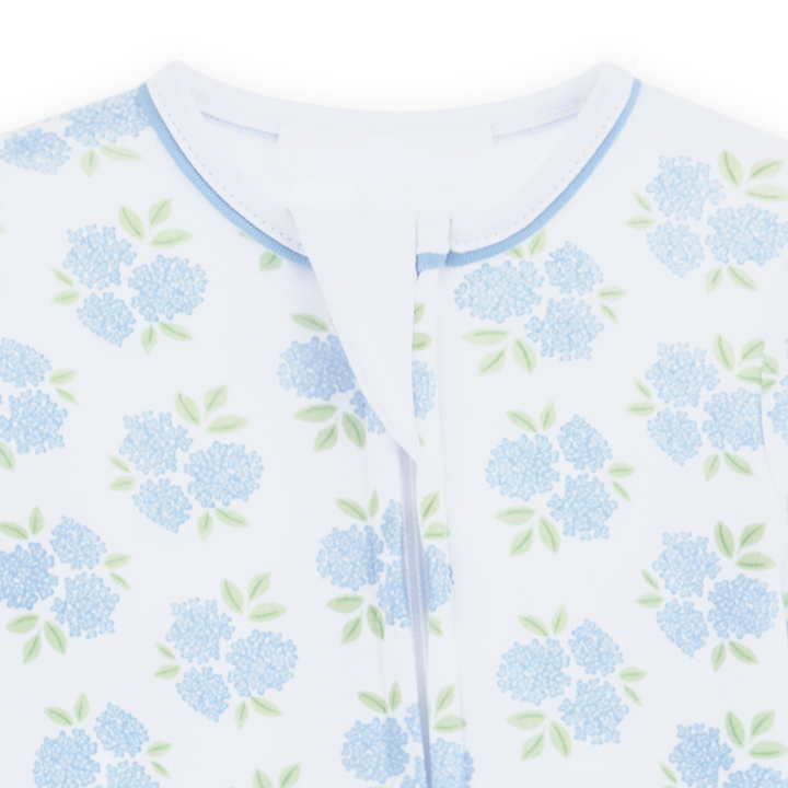 Allover hydrangea floral print in sky blue and soft green footie pajama