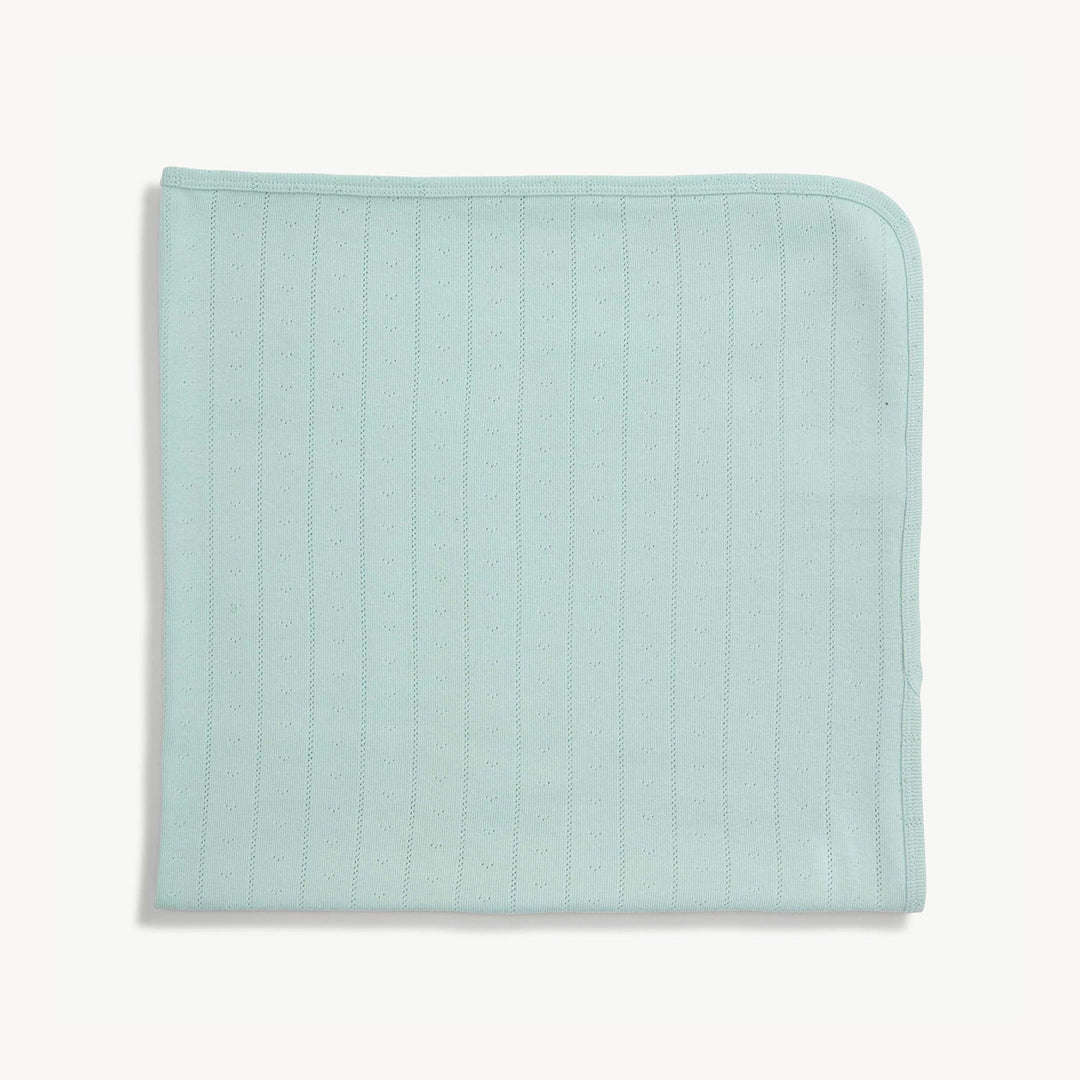 Magnetic Me Seagrass Love Lines pointelle baby blanket in soft light green with a fine vertical knit pattern