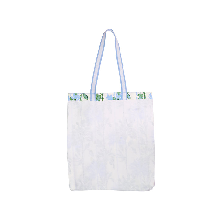 White tote bag with a floral pattern on a white background