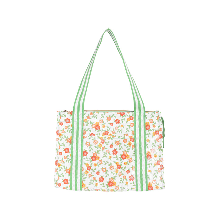 Floral tote bag with green straps on a white background