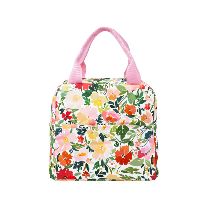 Floral-patterned bag with pink handles on a white background