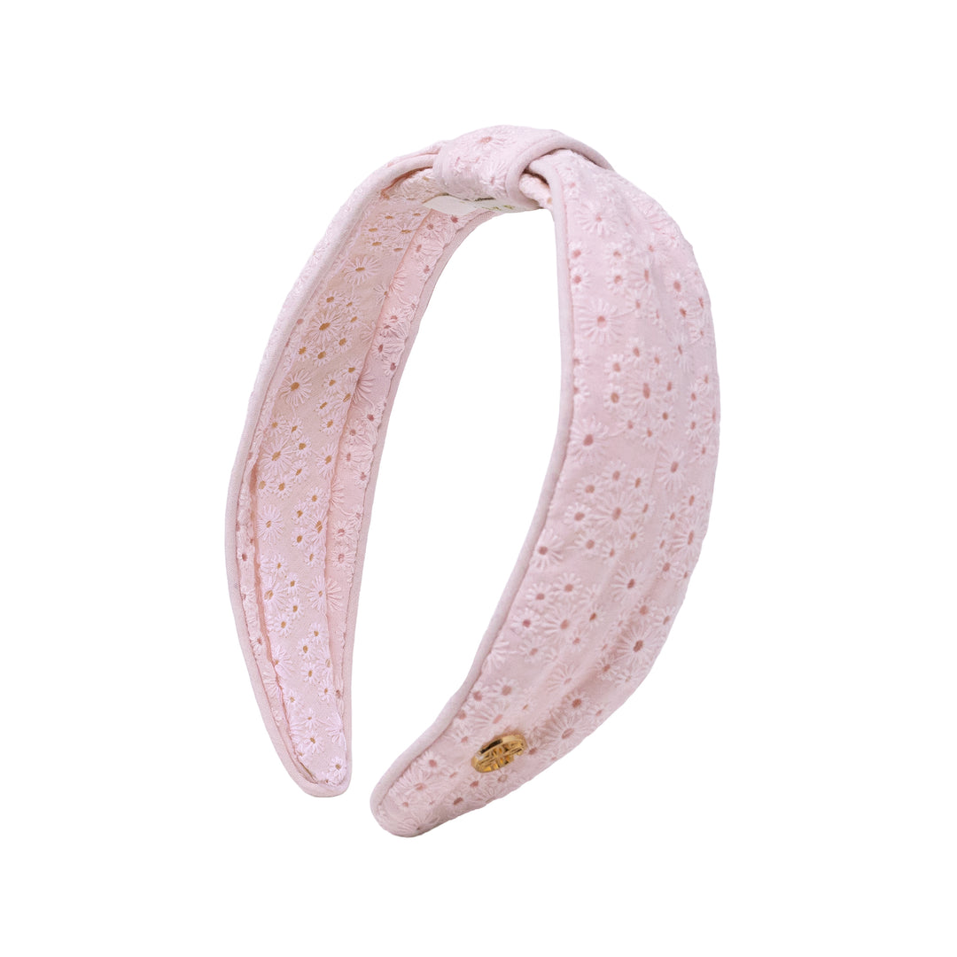 Pink textured headband on a white background