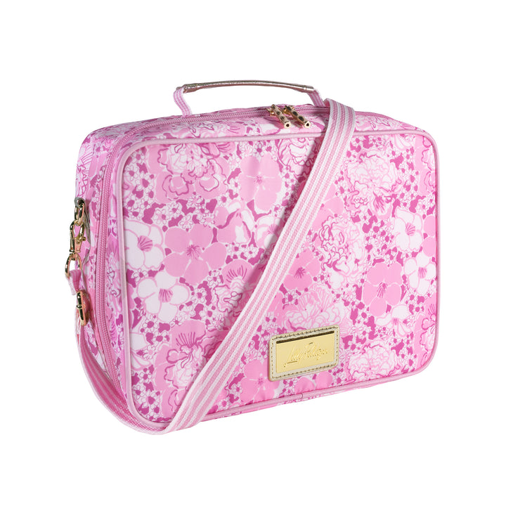 Pink floral patterned bag with a gold brand logo on a white background