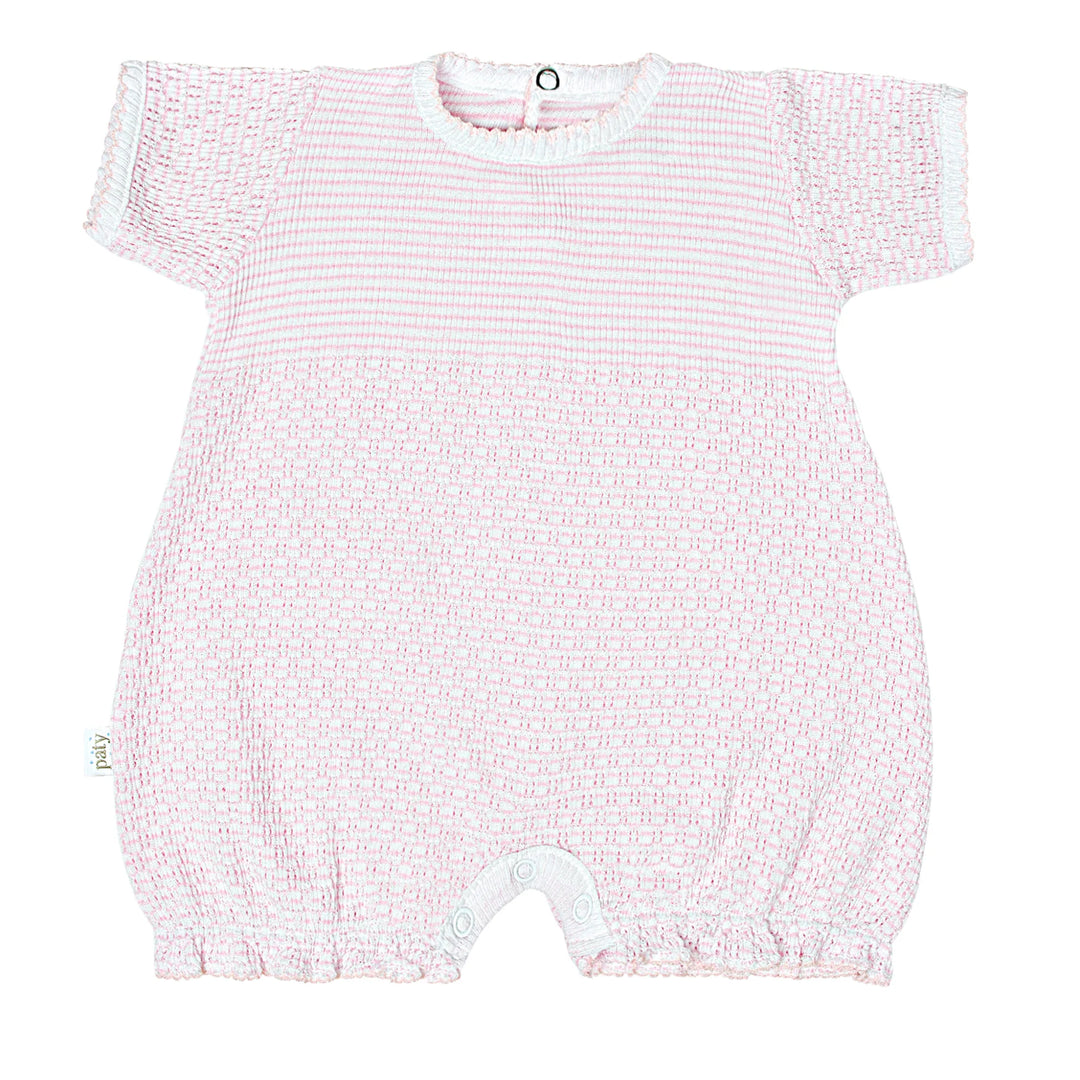 Pink baby romper with white stripes on a white background