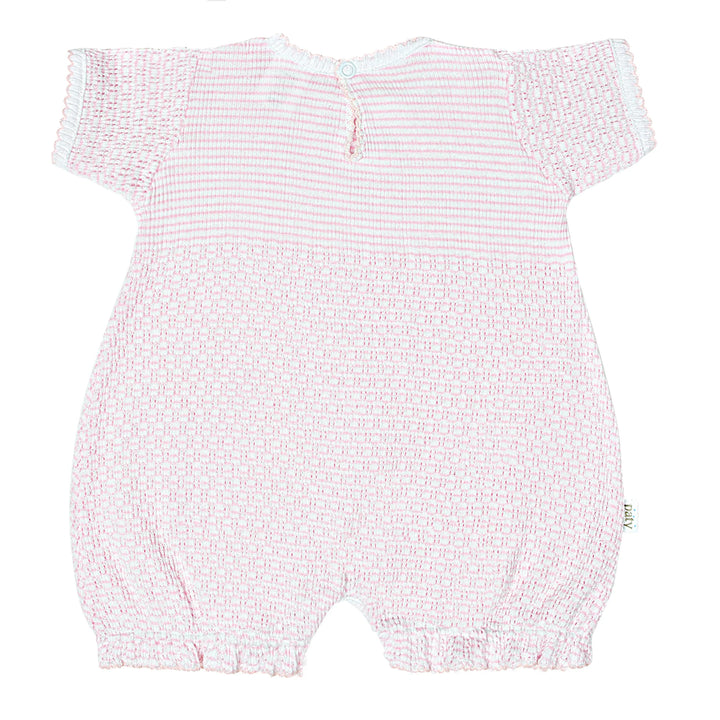 Pink baby romper with a subtle pattern on a white background