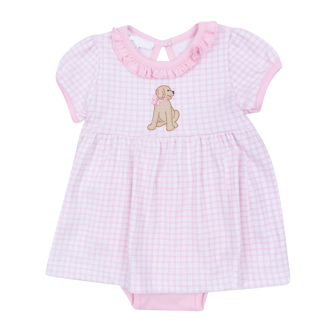 Soft pink check print on a white background with puppy applique in middle