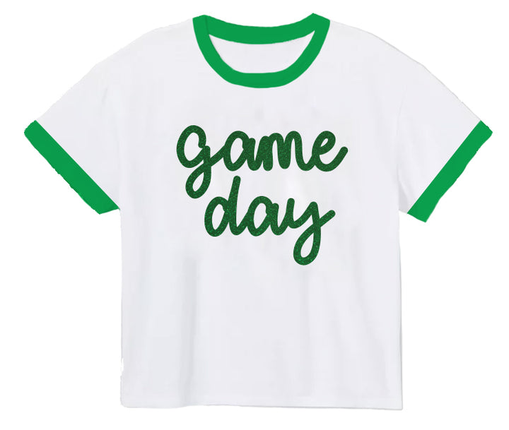 White t-shirt with green ringer sleeves and 'Game Day' text on a white background