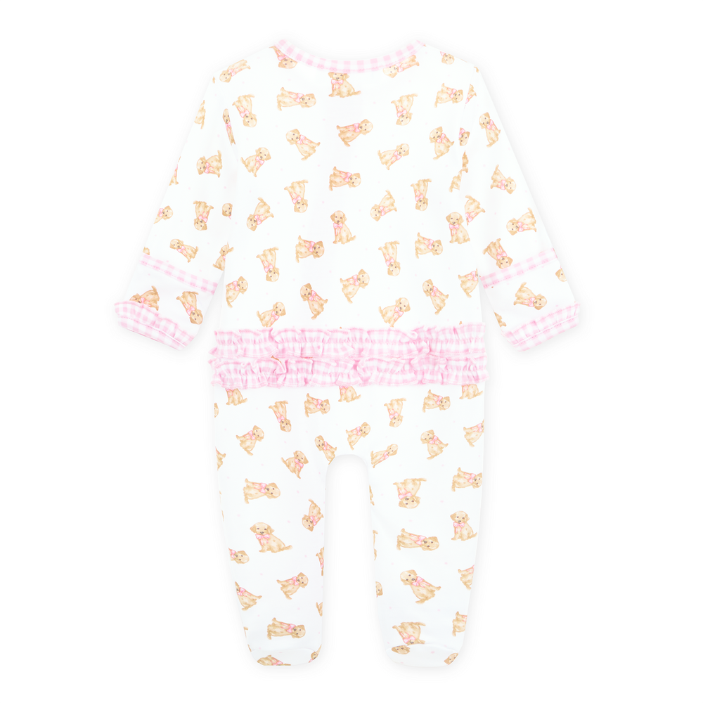 Allover golden puppy print on a white background footie with light pink gingham trim and long sleeves