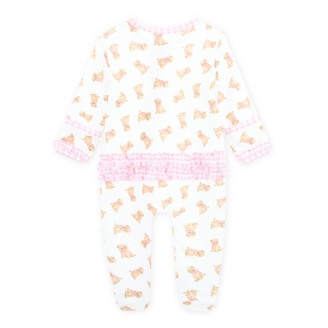 Allover golden puppy print on a white background footie with light pink gingham trim and long sleeves