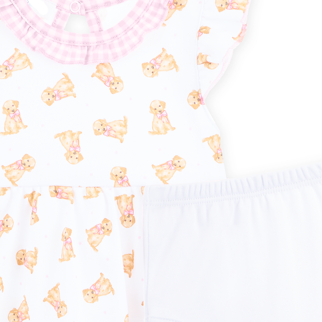 Close up shot of Allover golden puppy print on a white background
Flutter sleeves with soft pink gingham trim