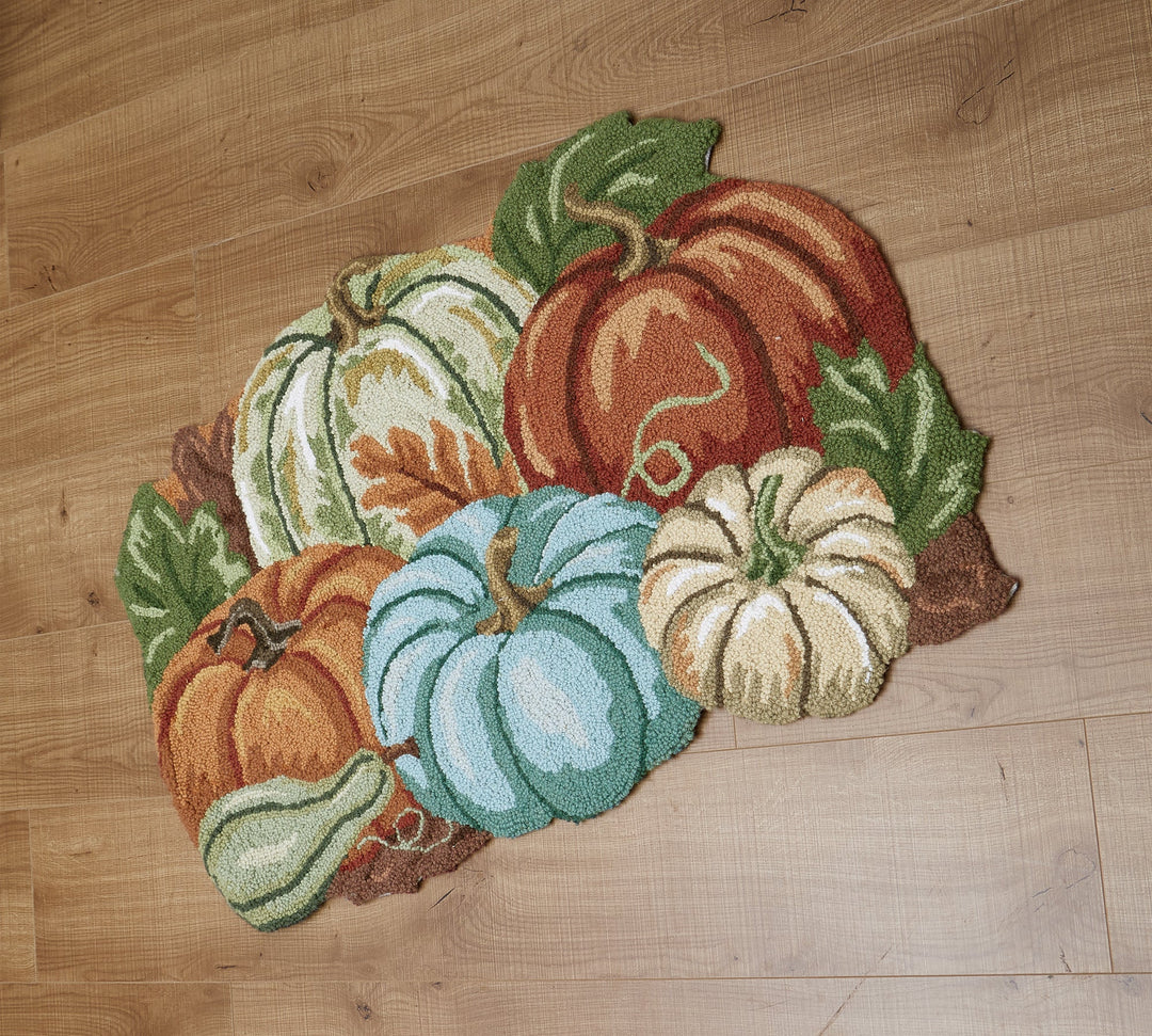 Decorative rug with pumpkins on a wooden floor