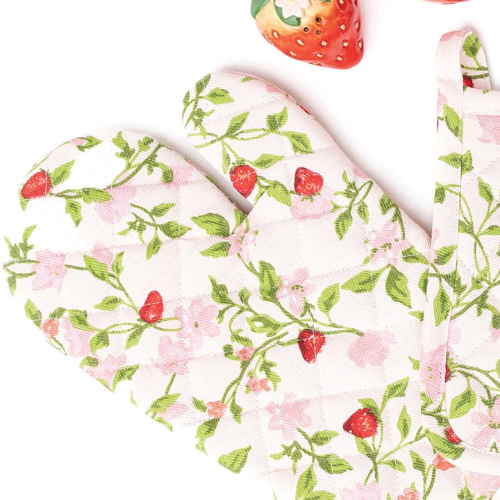 Floral and strawberry patterned fabric with strawberries on a white background