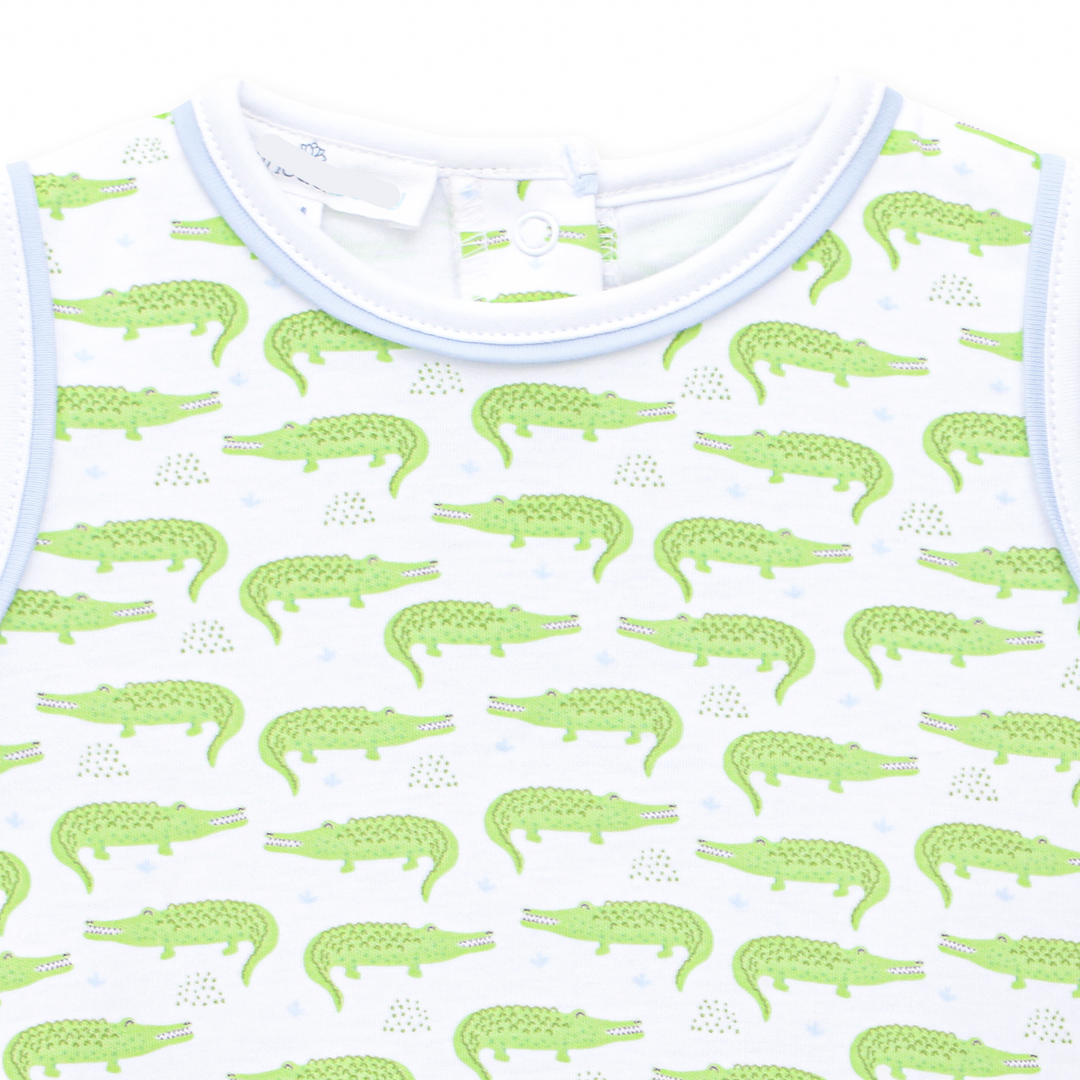 Boys playsuit in Allover Bayou Baby alligator print in soft green sleeveless