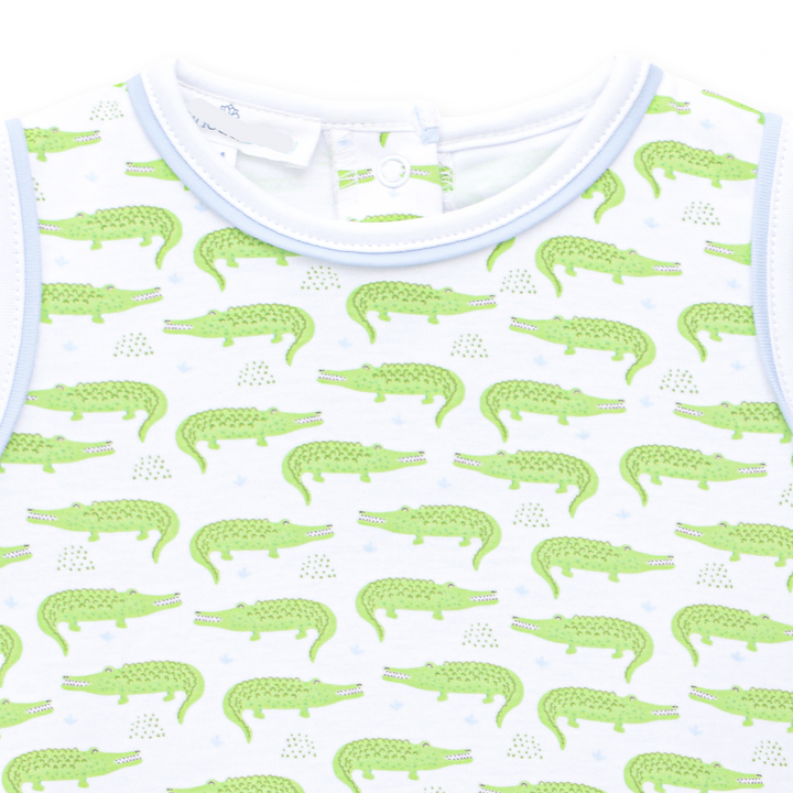 Boys playsuit in Allover Bayou Baby alligator print in soft green sleeveless