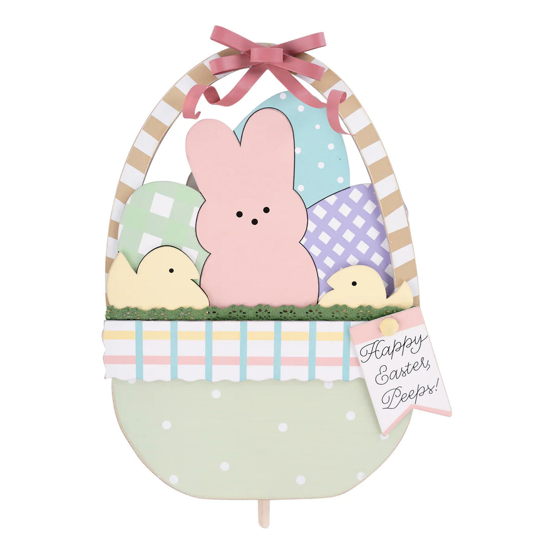 A decorative Easter basket with a Peeps bunny topper, featuring pastel colors and a striped pattern, placed on a white background.