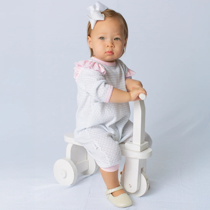 PATY KNIT PINK PINSTRIPE LONG SLEEVE RUFFLE SHOULDER ROMPER