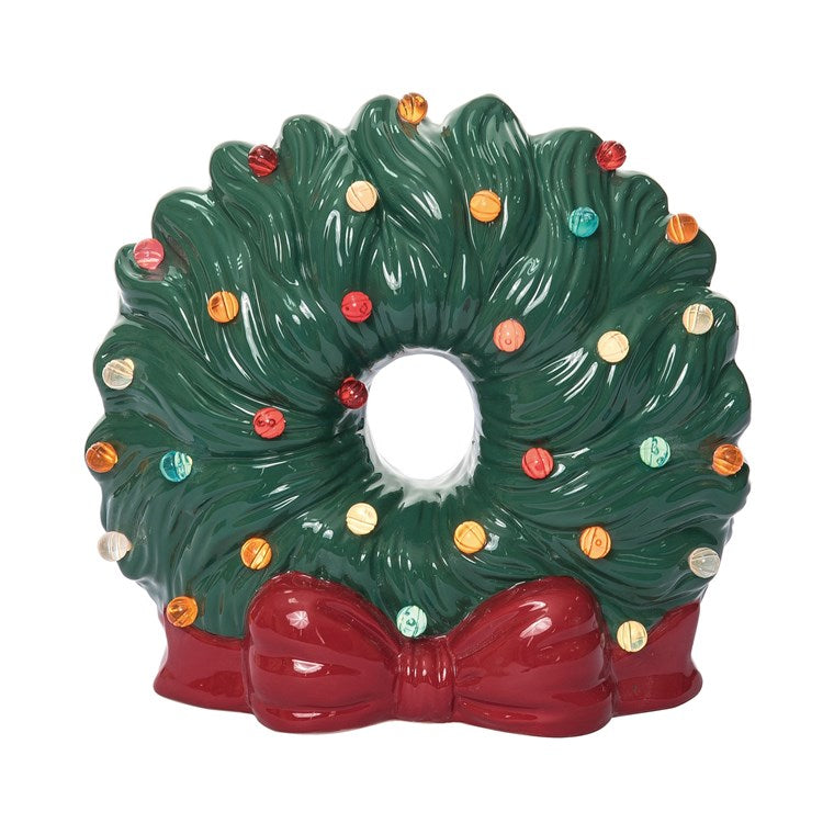 Decorative Christmas wreath with colorful lights on a white background