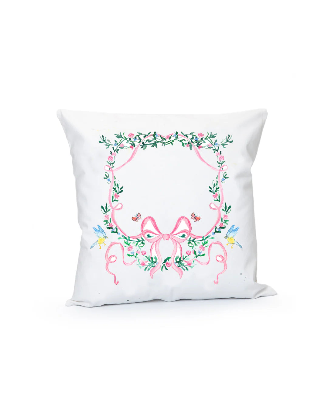 Decorative pillow with floral wreath design on a white background