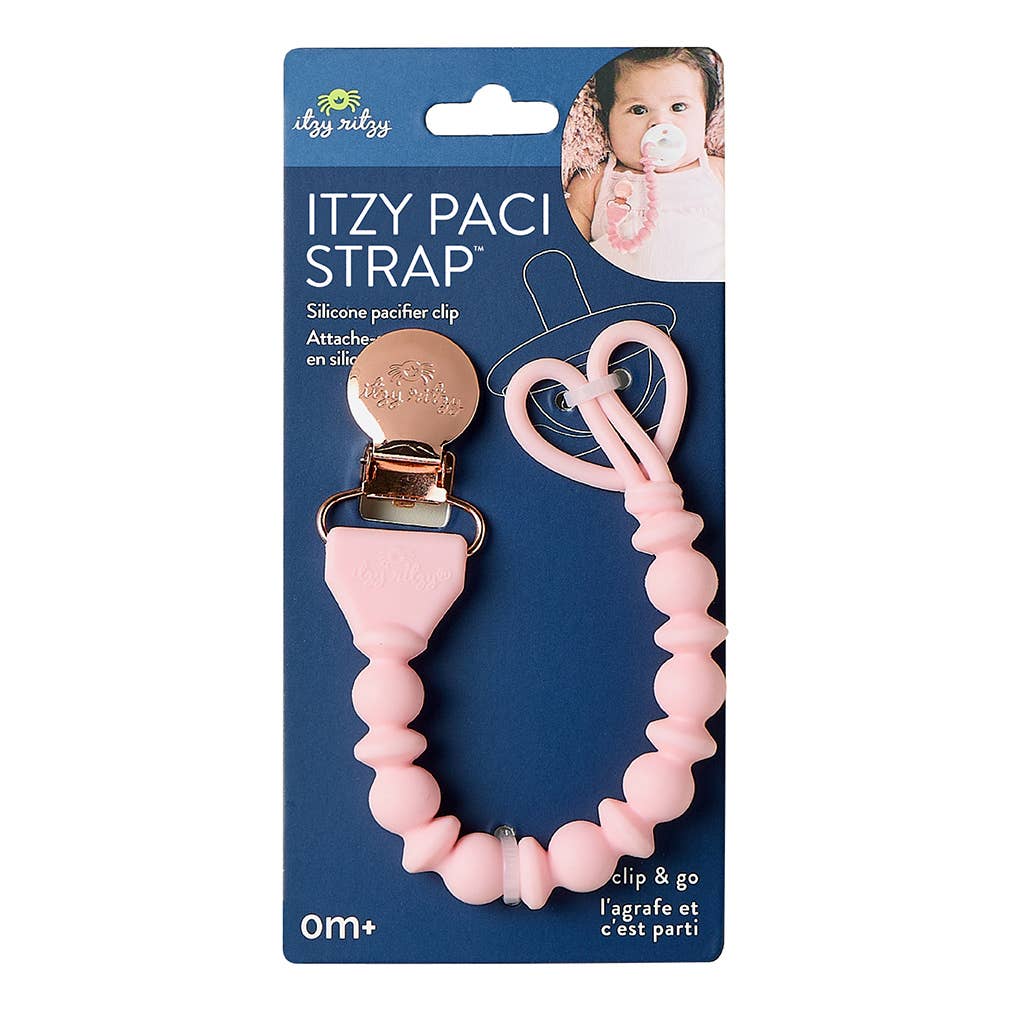 Pink pacifier clip with packaging on a white background