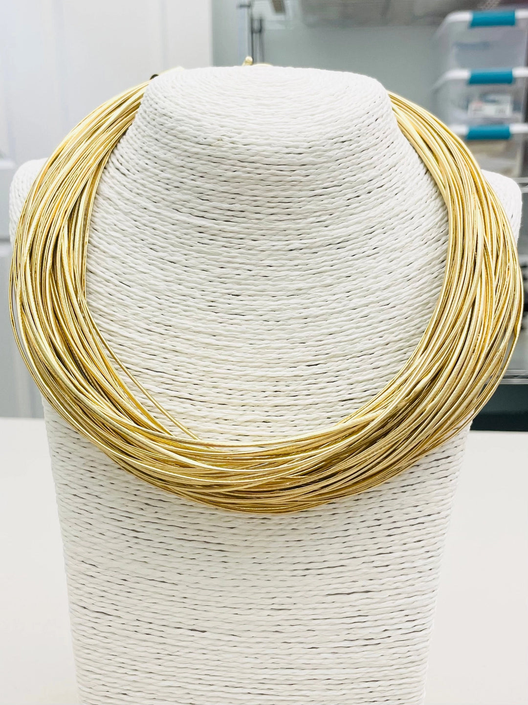 GOLD LEATHERETTE STRAND NECKLACE