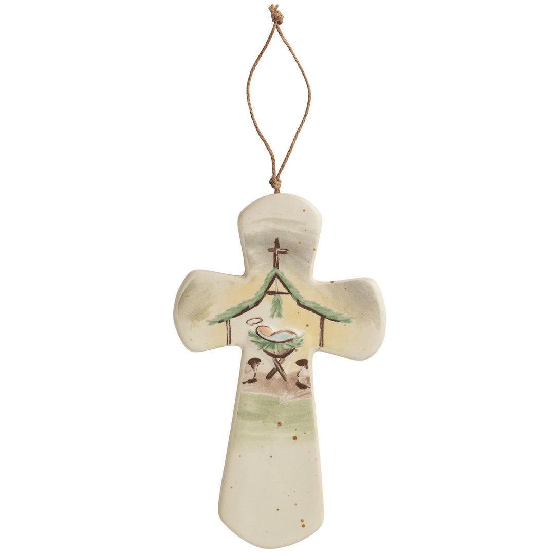 Stoneware cross with twine hanger. Sawtooth hardware.
