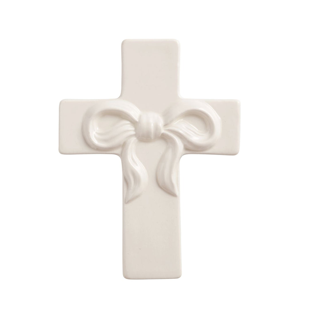 White ceramic cross wall décor with sculpted bow detail
