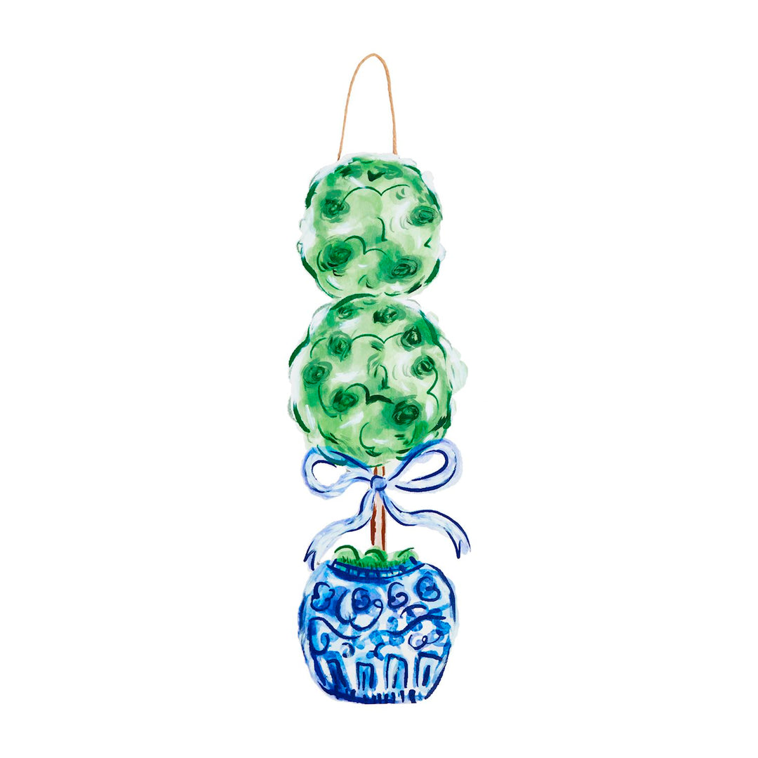 Chinoiserie topiary door hanger featuring double green topiary balls in blue and white ginger jar with bow detail and jute hanging loop